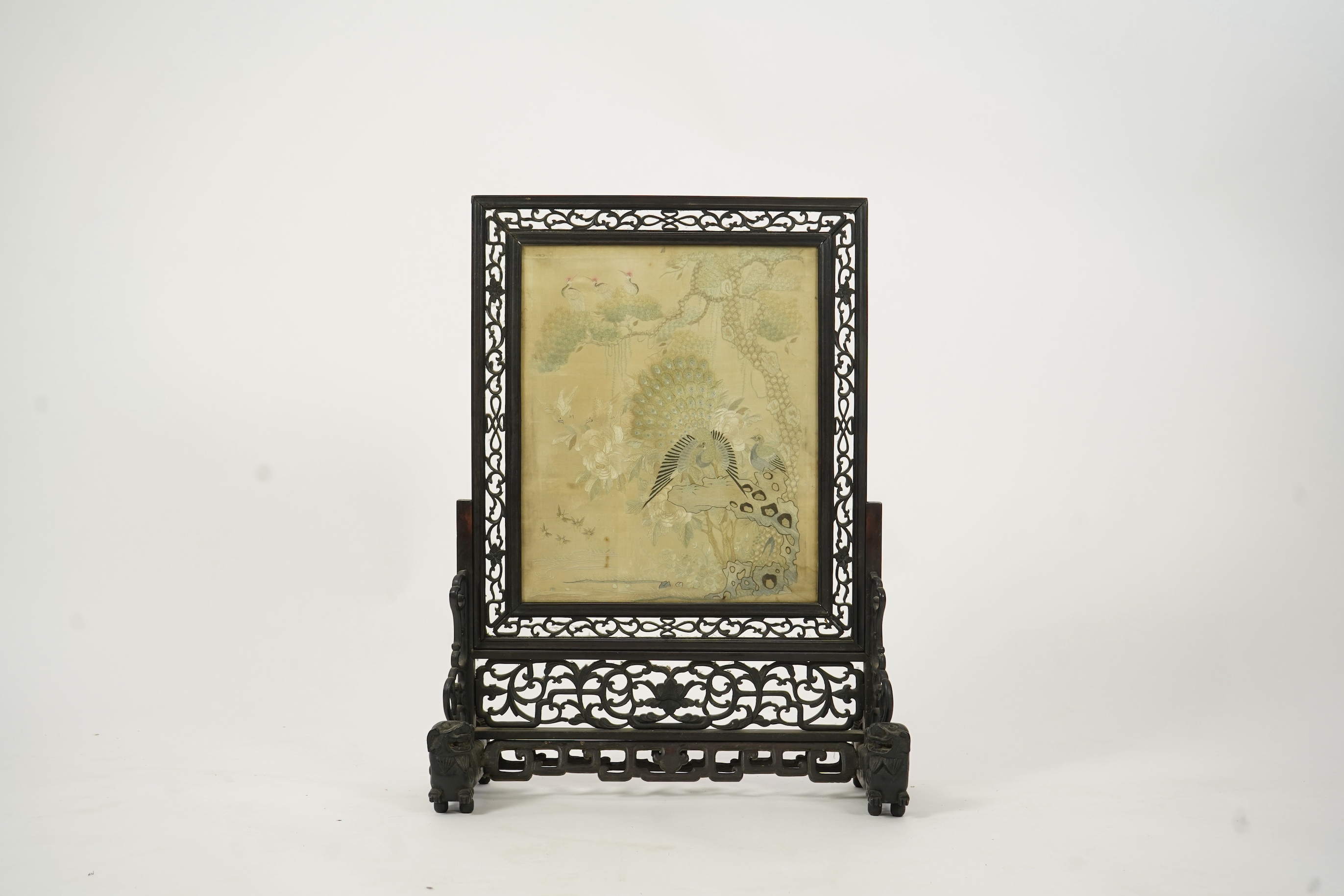 A Chinese ’Hundred bird’ embroidered silk table screen and hongmu stand, late 19th/early 20th century